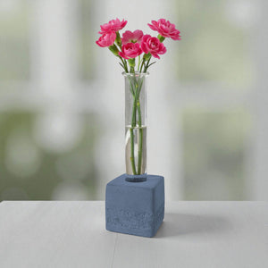 Blue square concrete test tube bud vase with pink flowers